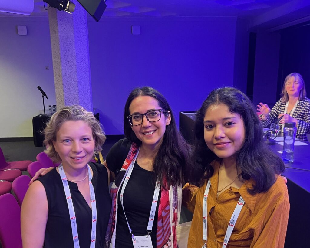Photograph of Palak, who is furthest on the right, with two fellow delegates at the Gynaecological Cancer Society