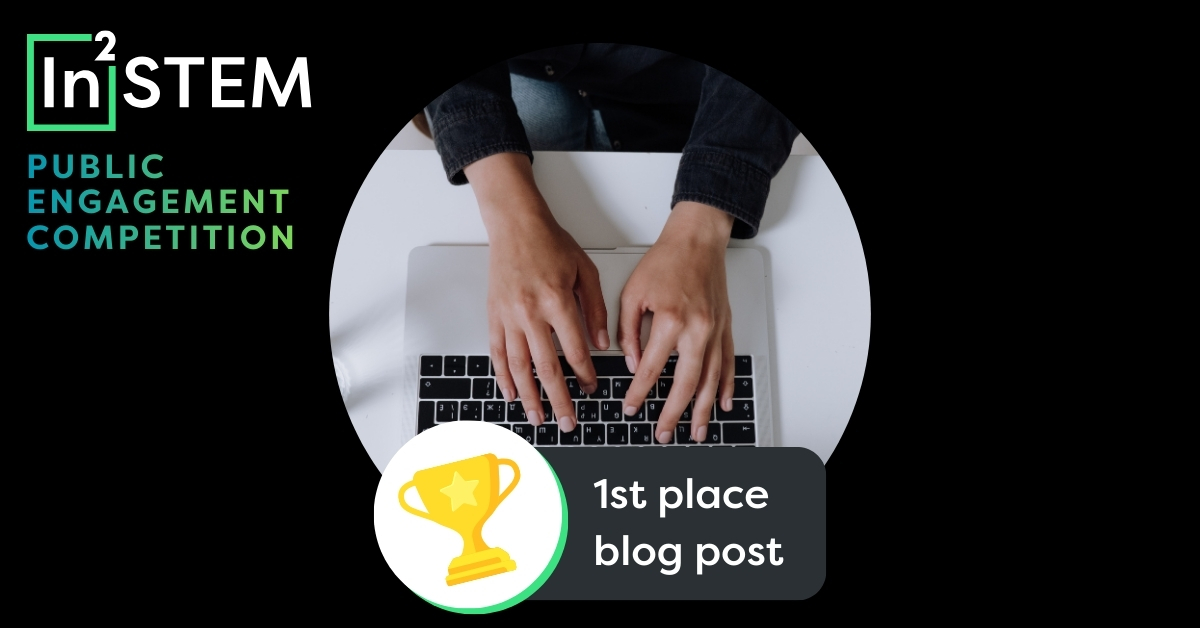 Graphic with In2STEM logo saying public engagement competition, a stock image of hands typing on a keyboard, and a trophy graphic below, with the text 1st place blog post along the bottom