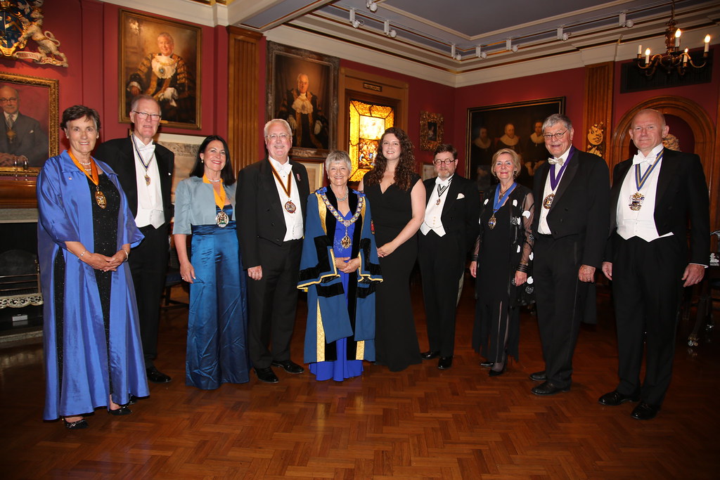 Photograph of attendees at the Worshipful Company of Scientific Instrument Makers' annual banquet, including In2scienceUK staff member Rebecca Jelbert with the WCSIM Master in the centre